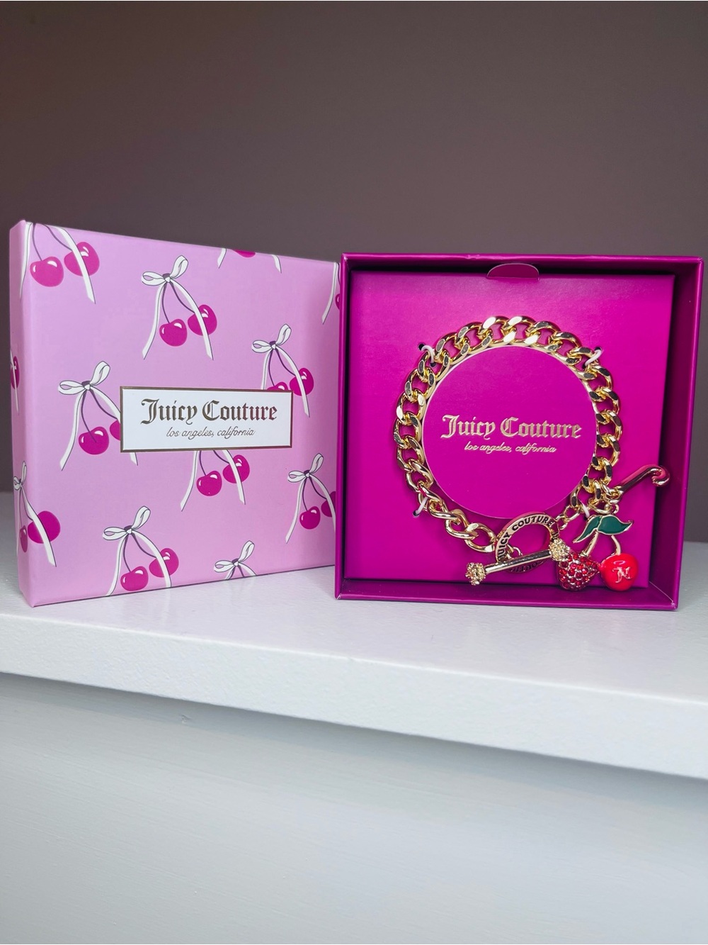 Juicy Couture Gold Chain Bracelet with Pink Cherry Charms
